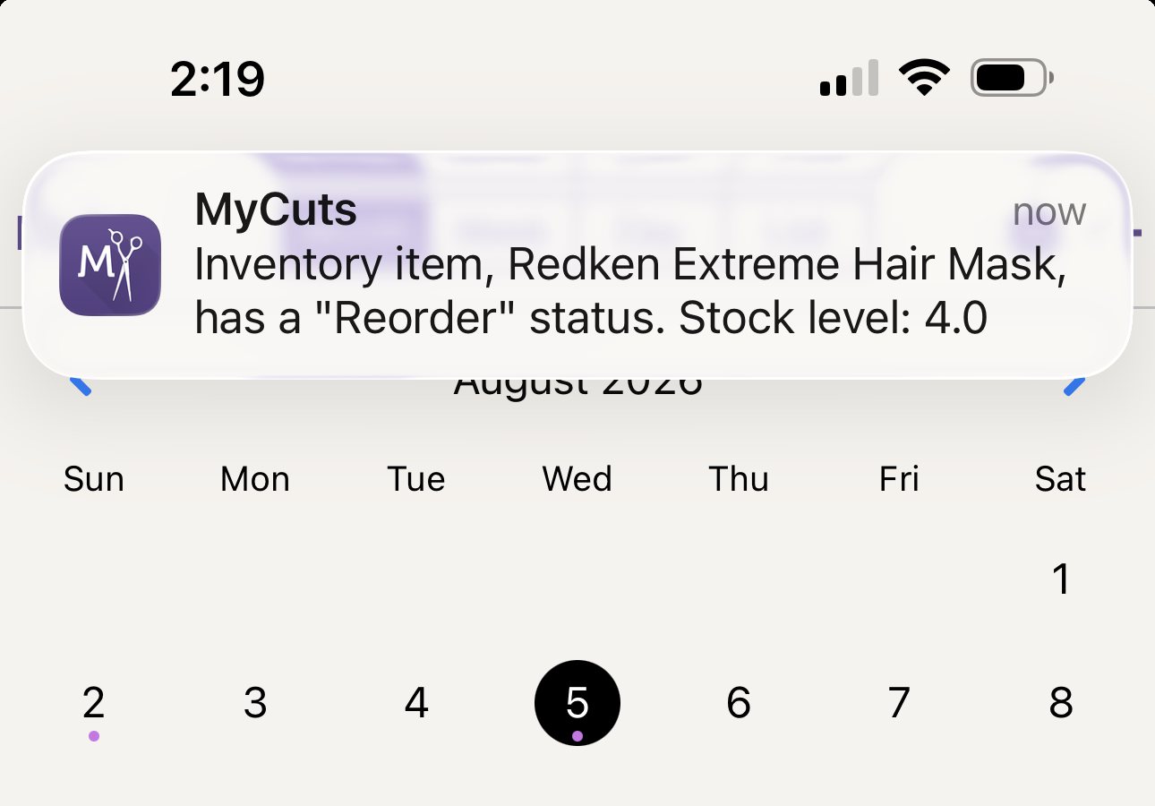 MyCuts push notification showing a salon inventory item with Reorder status